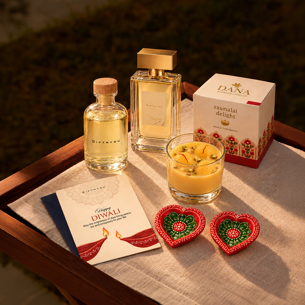 Diwali perfume and candle gift set with two decorative diyas, GiftNYou bottle and greeting card