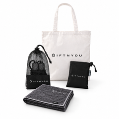 The Move Together Kit by GiftNYou with black skipping rope with mesh storage pouch, grey sports towel, black drawstring storage pouch on a white background