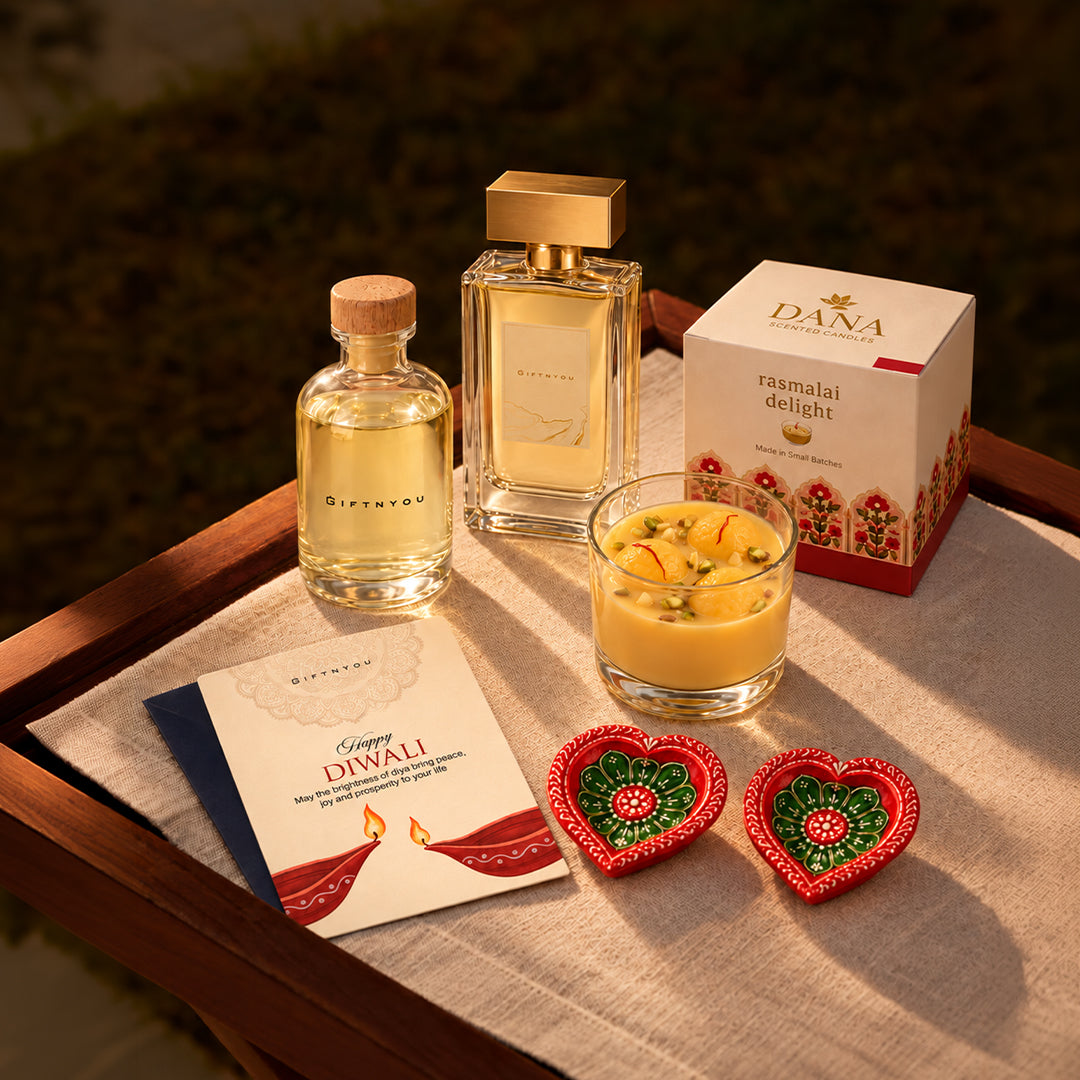 Diwali perfume and candle gift set with two decorative diyas, GiftNYou bottle and greeting card