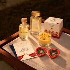 Diwali perfume and candle gift set with two decorative diyas, GiftNYou bottle and greeting card