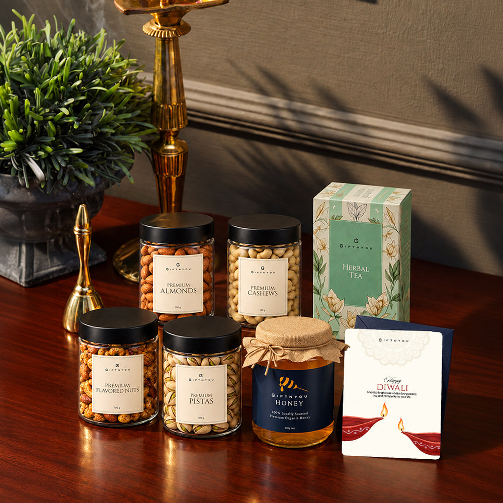The Diwali Tea & Treats Hamper by GiftNYou in a festive lifestyle setting