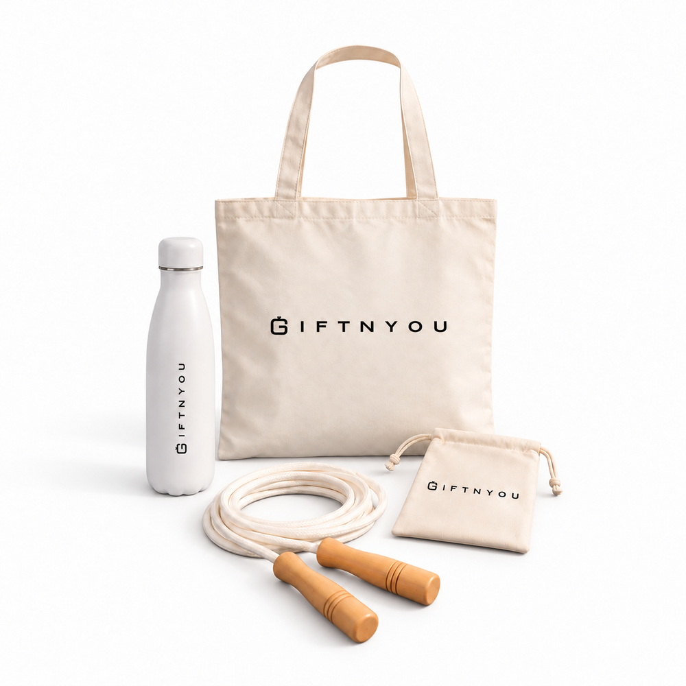The Daily Movement Kit by GiftNYou with white water bottle, skipping rope with wooden handles, small natural-coloured drawstring pouch on a white background